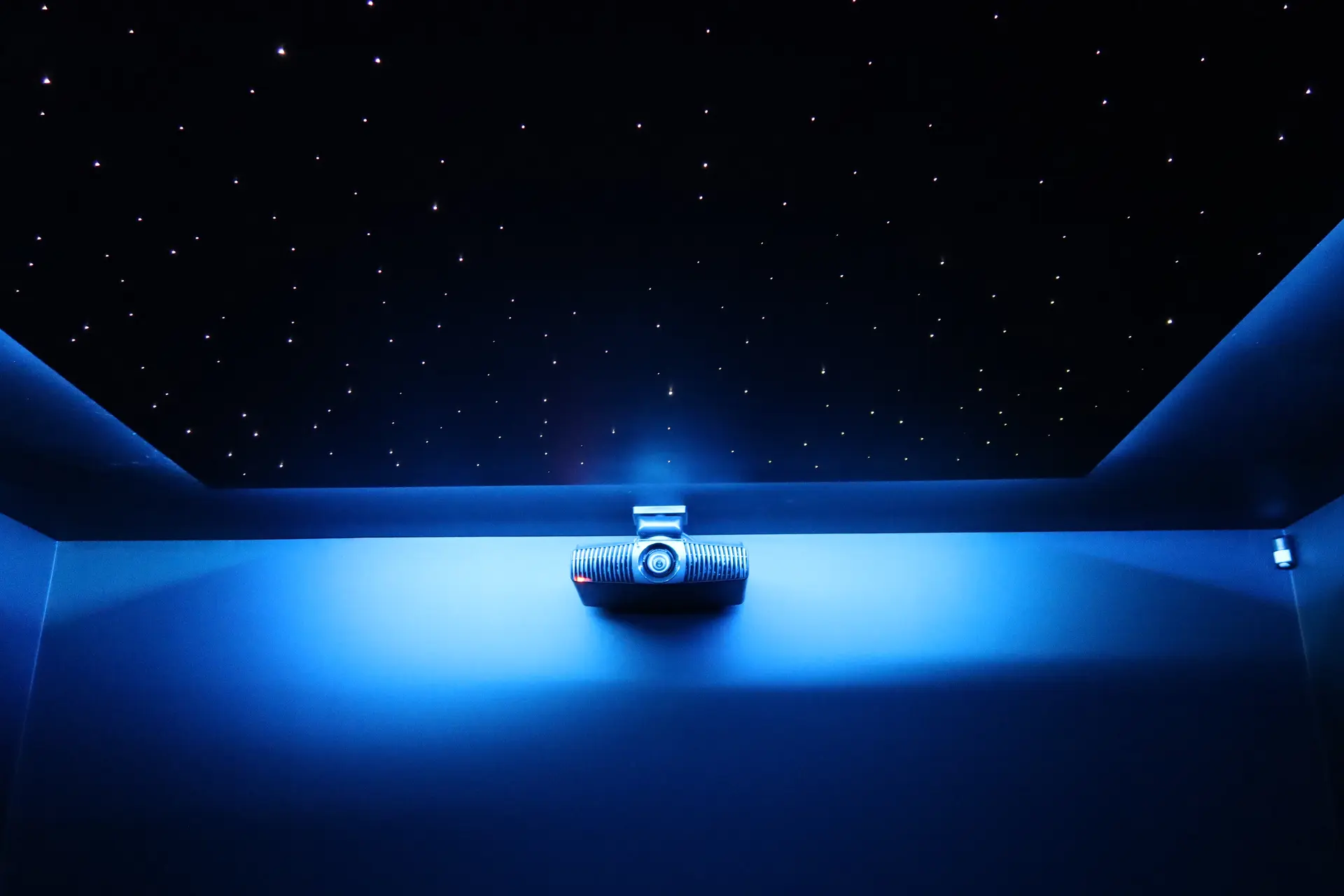 Home theatre with star ceiling and projector