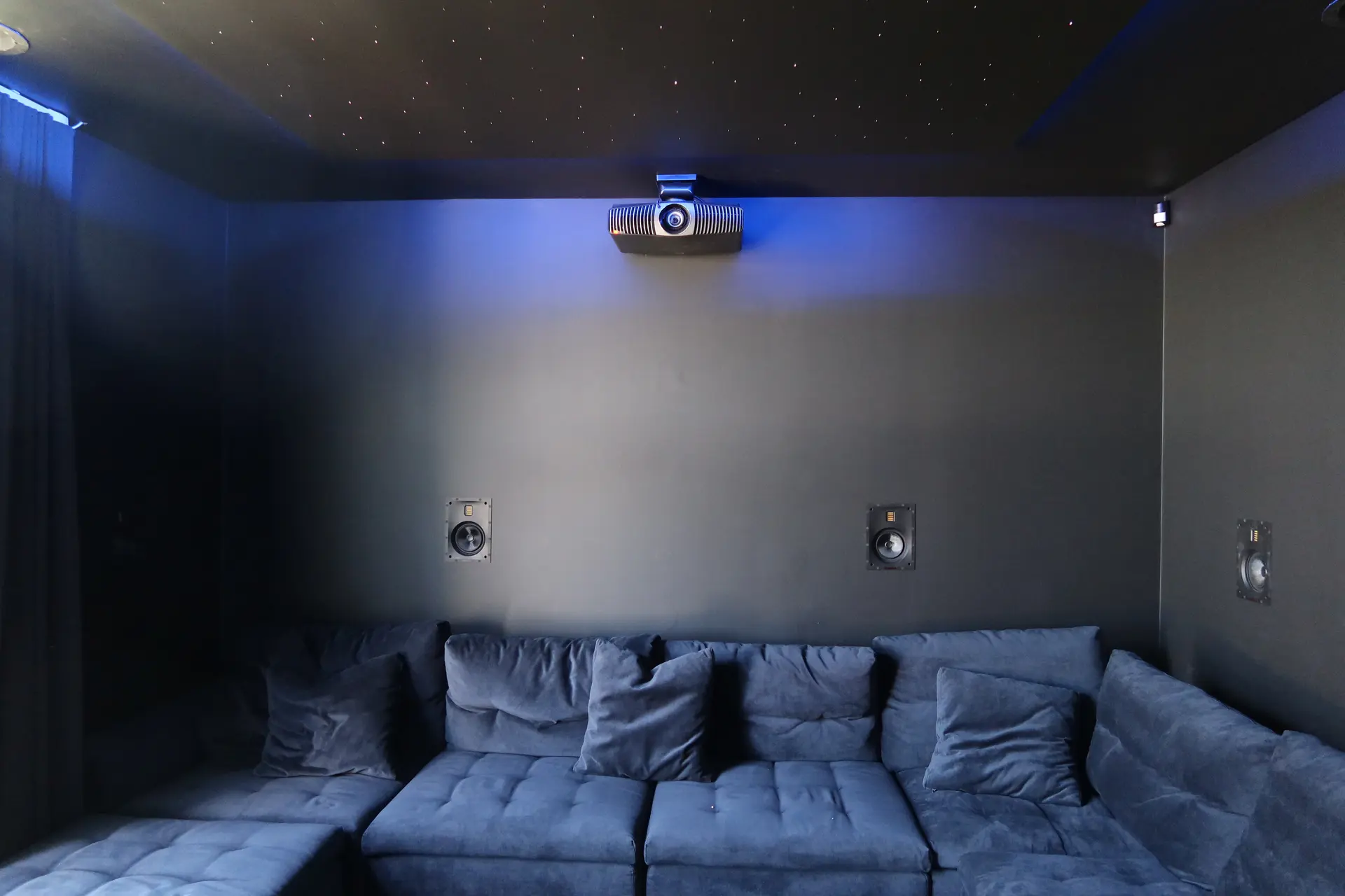 Custom home cinema with starfield ceiling